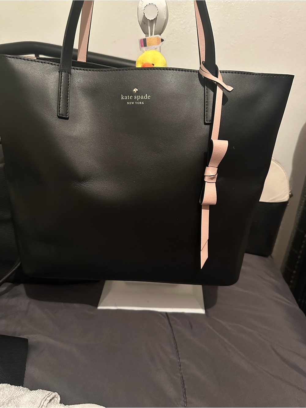 kate spade black tote with pink bow detail